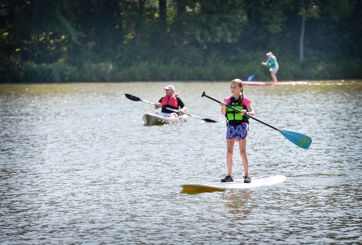 Child paddle boarding Wilcks Lake