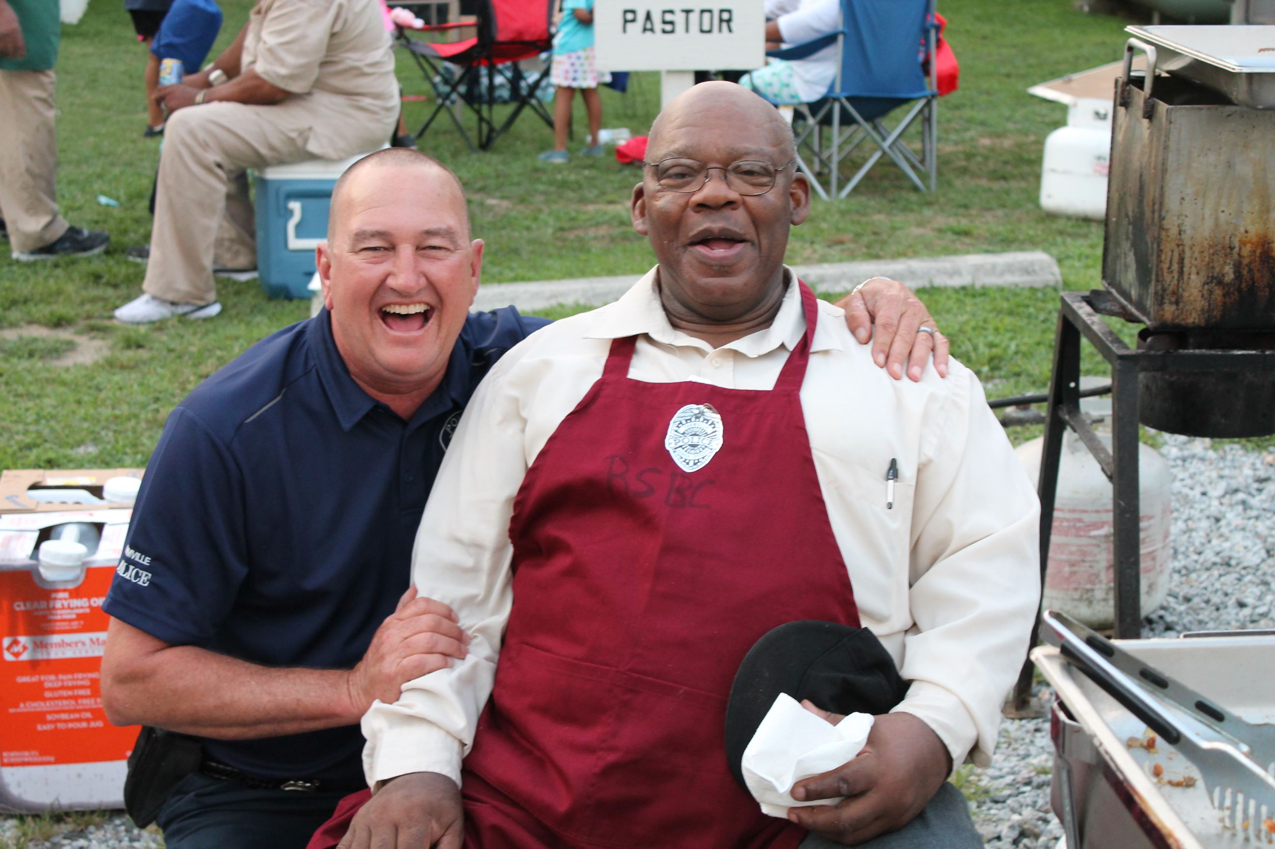 Two men posing for photo